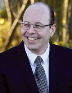 Bedemand taler ved begravelse eller bisættelse